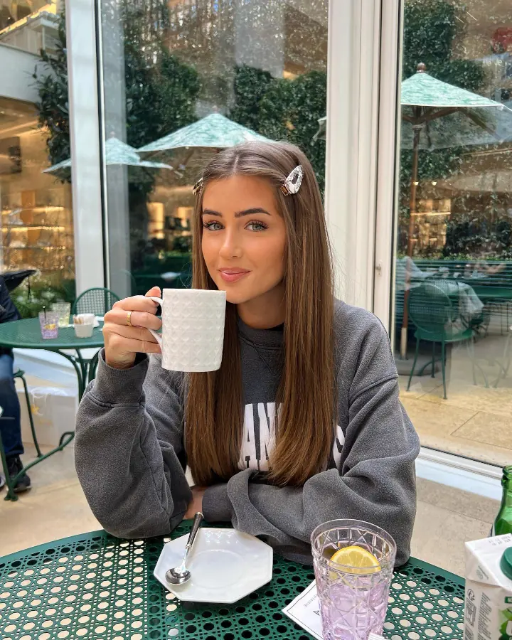 Georgia Steel Drinking Coffee