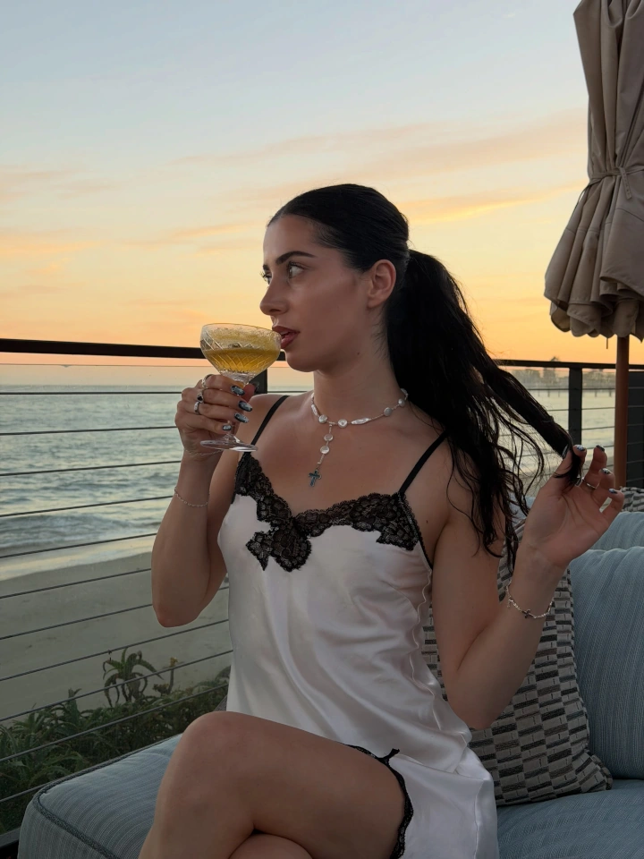 Yasmin Pettet Drinking Wine