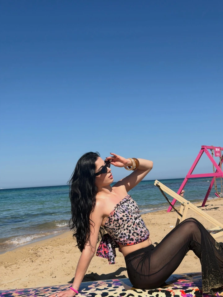 Yasmin Pettet Relaxing on Beach